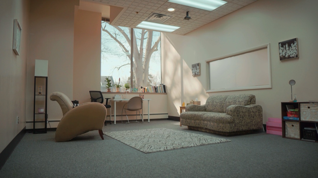 A bright, comfortable therapy room at Wellness Therapy Center