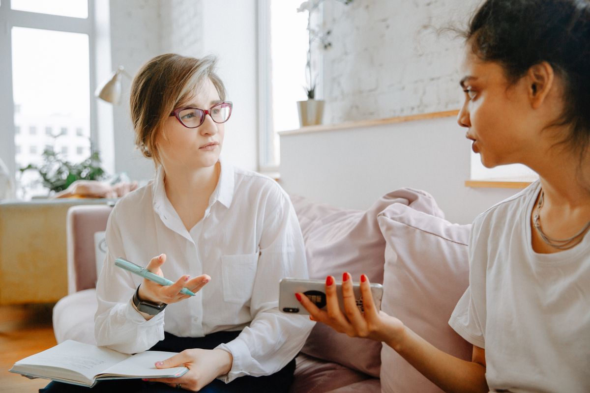 A therapist speaking with a client during an individual counseling session