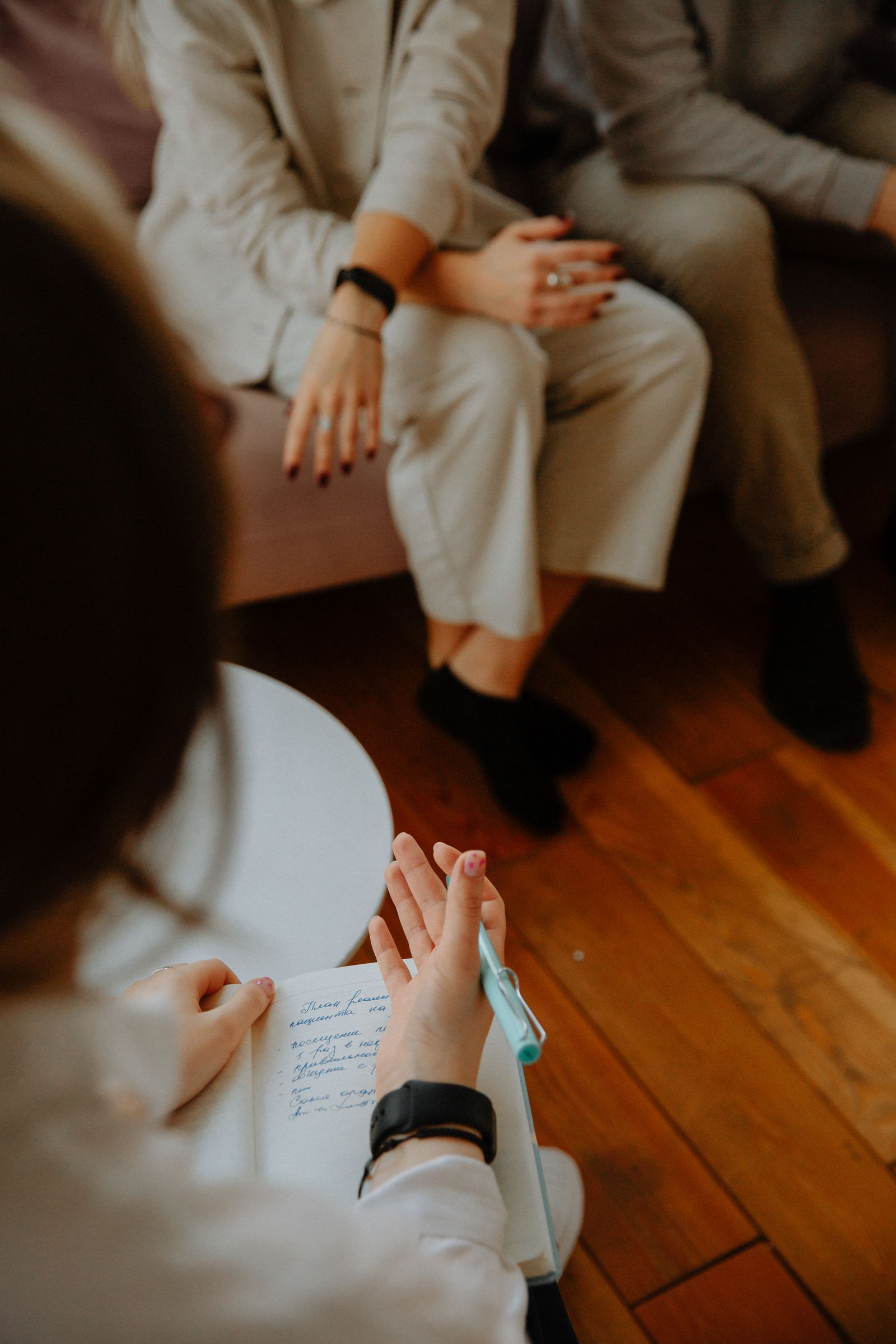 A therapist counseling a couple as they prepare for marriage